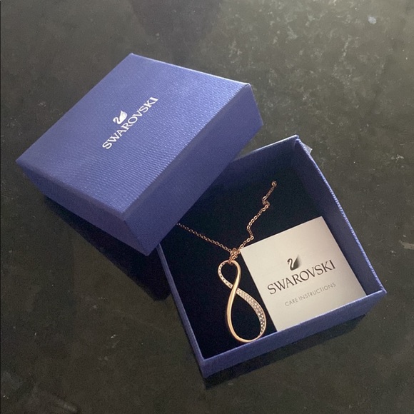 Swarovski Jewelry - NWOT SWAROVSKI INFINITY ROSEGOLD NECKLACE